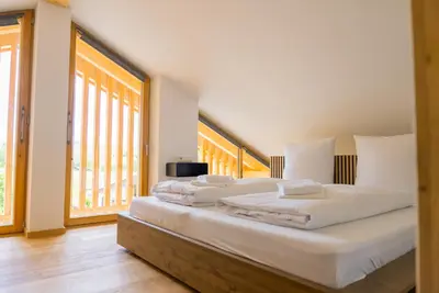 Ein Bett oder Betten in einem Zimmer der Unterkunft Bergblick Chalet