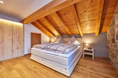 Ein Bett oder Betten in einem Zimmer der Unterkunft Haus Daheim