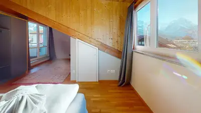 Ein Bett oder Betten in einem Zimmer der Unterkunft WeitsichtLodge