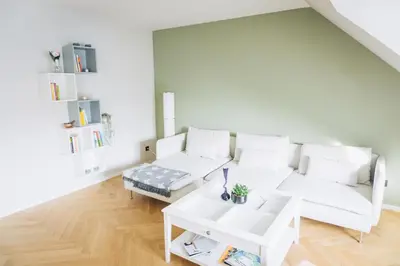 Ein Sitzbereich in der Unterkunft raum life - Design Apartment in Hallbergmoos