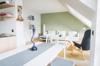 Ein Sitzbereich in der Unterkunft raum life - Design Apartment in Hallbergmoos