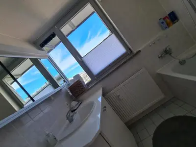 Ein Badezimmer in der Unterkunft Ridler Theresienwiese, parking & rooftop terraces 2 room
