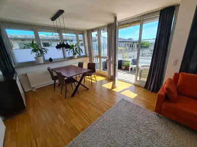Ein Sitzbereich in der Unterkunft Ridler Theresienwiese, parking & rooftop terraces 2 room