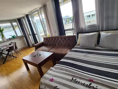 Ein Bett oder Betten in einem Zimmer der Unterkunft Ridler Theresienwiese, parking & rooftop terraces 2 room