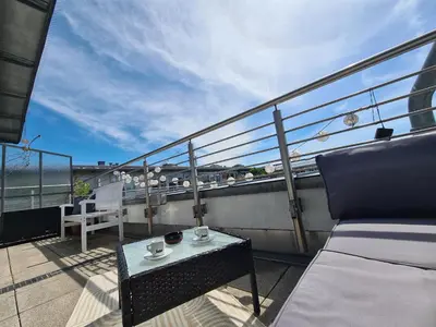 Ein Balkon oder eine Terrasse in der Unterkunft Ridler Theresienwiese, parking & rooftop terraces 2 room