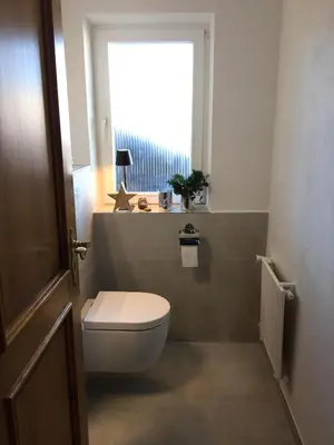 Ein Badezimmer in der Unterkunft Haus Hochland - Großzügige Alpenwohnung im Dachgeschoss