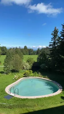 Der Swimmingpool an oder in der Nähe von Haus Hochland - Großzügige Alpenwohnung im Dachgeschoss