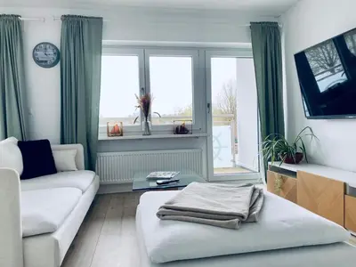 Ein Bett oder Betten in einem Zimmer der Unterkunft Das Bootshaus