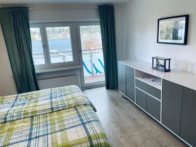 Ein Bett oder Betten in einem Zimmer der Unterkunft Das Bootshaus