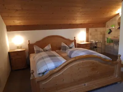 Ein Bett oder Betten in einem Zimmer der Unterkunft Apartment Utschneider-Holzer