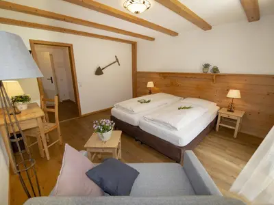 Ein Bett oder Betten in einem Zimmer der Unterkunft Zum Kistlerwirt