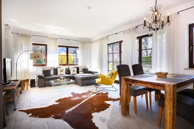 Ein Sitzbereich in der Unterkunft Olympia-Residence