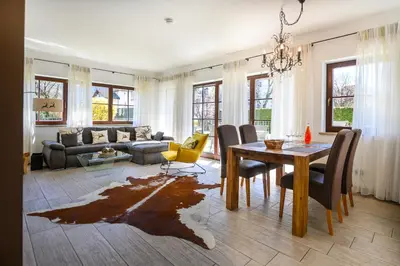 Ein Sitzbereich in der Unterkunft Olympia-Residence
