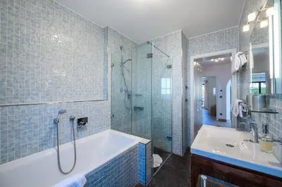 Ein Badezimmer in der Unterkunft Olympia-Residence