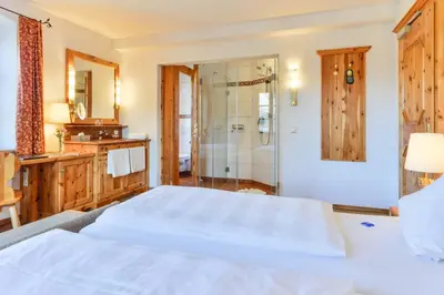 Ein Bett oder Betten in einem Zimmer der Unterkunft Landgasthof zum Erdinger Weissbräu