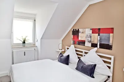 Ein Bett oder Betten in einem Zimmer der Unterkunft Steinhauser`s Ferienwohnungen