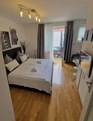 Ein Bett oder Betten in einem Zimmer der Unterkunft Steinhauser`s Ferienwohnungen