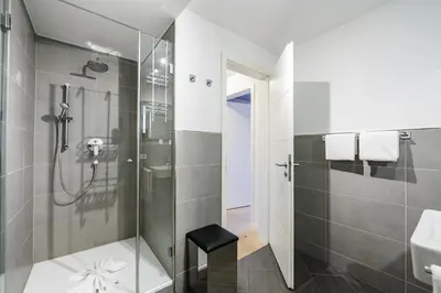 Ein Badezimmer in der Unterkunft Alpenhirsch