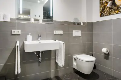 Ein Badezimmer in der Unterkunft Alpenhirsch