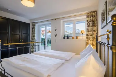 Ein Bett oder Betten in einem Zimmer der Unterkunft Alpenhirsch