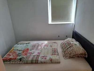 Ein Bett oder Betten in einem Zimmer der Unterkunft Nensi