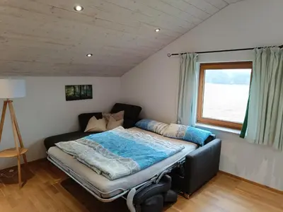 Ein Bett oder Betten in einem Zimmer der Unterkunft Ferienwohnung auf dem Land
