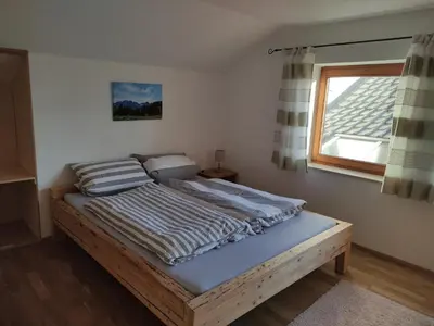 Ein Bett oder Betten in einem Zimmer der Unterkunft Ferienwohnung auf dem Land