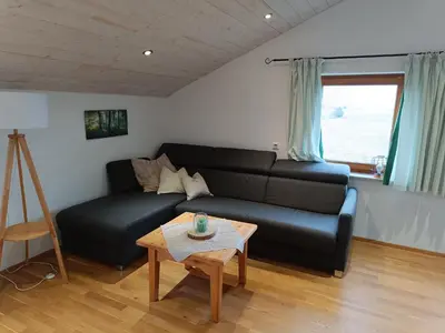 Ein Sitzbereich in der Unterkunft Ferienwohnung auf dem Land