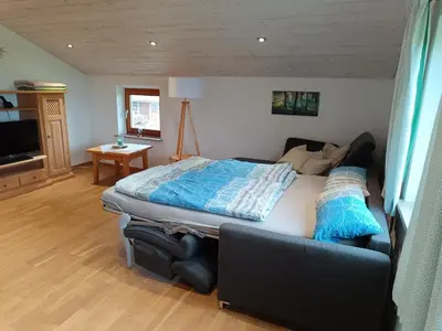 Ein Bett oder Betten in einem Zimmer der Unterkunft Ferienwohnung auf dem Land