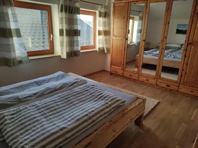 Ein Bett oder Betten in einem Zimmer der Unterkunft Ferienwohnung auf dem Land