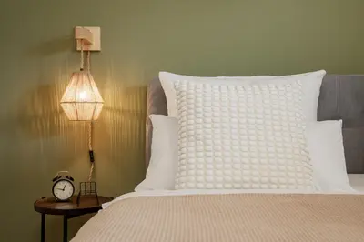 Ein Bett oder Betten in einem Zimmer der Unterkunft FENJOY Ferienapartments am Chiemsee - Balkon - BBQ