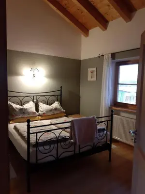 Ein Bett oder Betten in einem Zimmer der Unterkunft Ferienwohnung Bartl