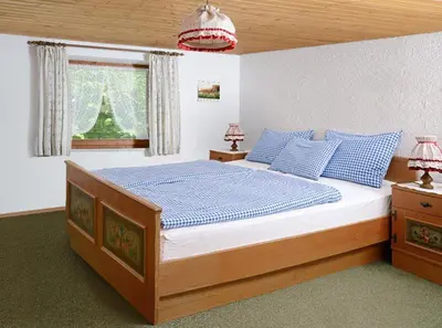 Ein Bett oder Betten in einem Zimmer der Unterkunft Ferienhaus Dickertsmühle