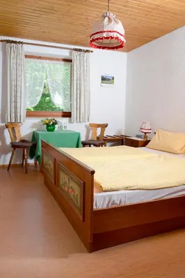 Ein Bett oder Betten in einem Zimmer der Unterkunft Ferienhaus Dickertsmühle