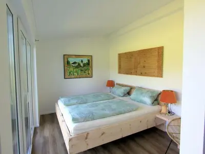 Ein Bett oder Betten in einem Zimmer der Unterkunft Dennenboomdroom