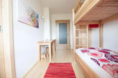 Ein Bett oder Betten in einem Zimmer der Unterkunft Huberhof
