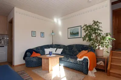 Ein Sitzbereich in der Unterkunft Huberhof