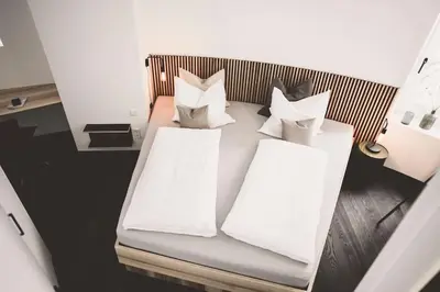 Ein Bett oder Betten in einem Zimmer der Unterkunft Wasserturm Pirach