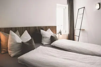 Ein Bett oder Betten in einem Zimmer der Unterkunft Wasserturm Pirach