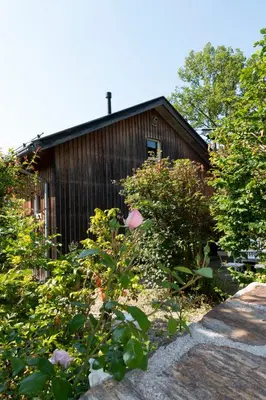 Ein Garten an der Unterkunft Rückzugsort mitten im Paradies