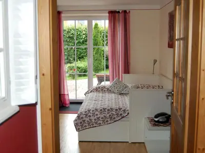 Ein Bett oder Betten in einem Zimmer der Unterkunft Landhaus Ambiente