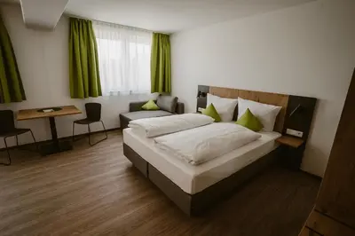 Ein Bett oder Betten in einem Zimmer der Unterkunft Motel Sleep Inn