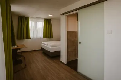 Ein Bett oder Betten in einem Zimmer der Unterkunft Motel Sleep Inn