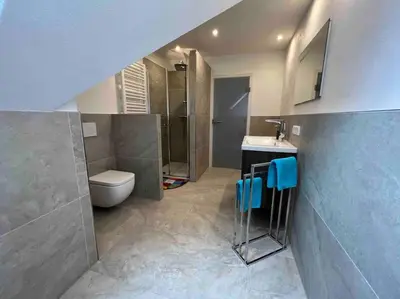Ein Badezimmer in der Unterkunft Ferienwohnung Saumpfad 25 Min ins Legoland