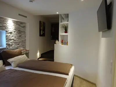 Ein Bett oder Betten in einem Zimmer der Unterkunft Appartement Ambiente