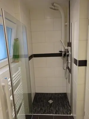 Ein Badezimmer in der Unterkunft Appartement Ambiente