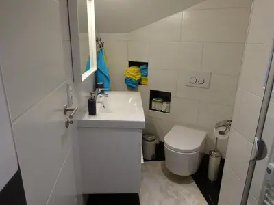 Ein Badezimmer in der Unterkunft Appartement Ambiente