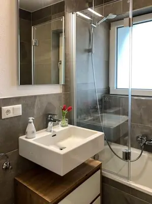 Ein Badezimmer in der Unterkunft Zentrales Appartement im Alpin-Style in Garmisch