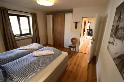 Ein Bett oder Betten in einem Zimmer der Unterkunft Isarkindl