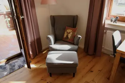 Ein Sitzbereich in der Unterkunft Isarkindl